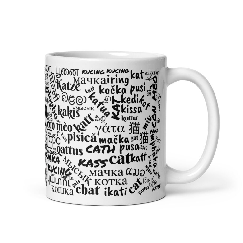 Taza blanca cómo se dice gato en diferentes idiomas